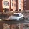 Воду, которая затопила въезд в мкрн Юбилейный в Костанае, откачали